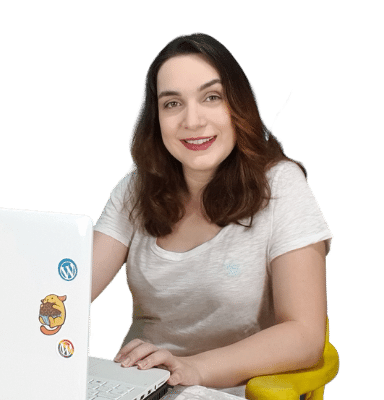 Katharina Farina com laptop com stickers do WordPress
